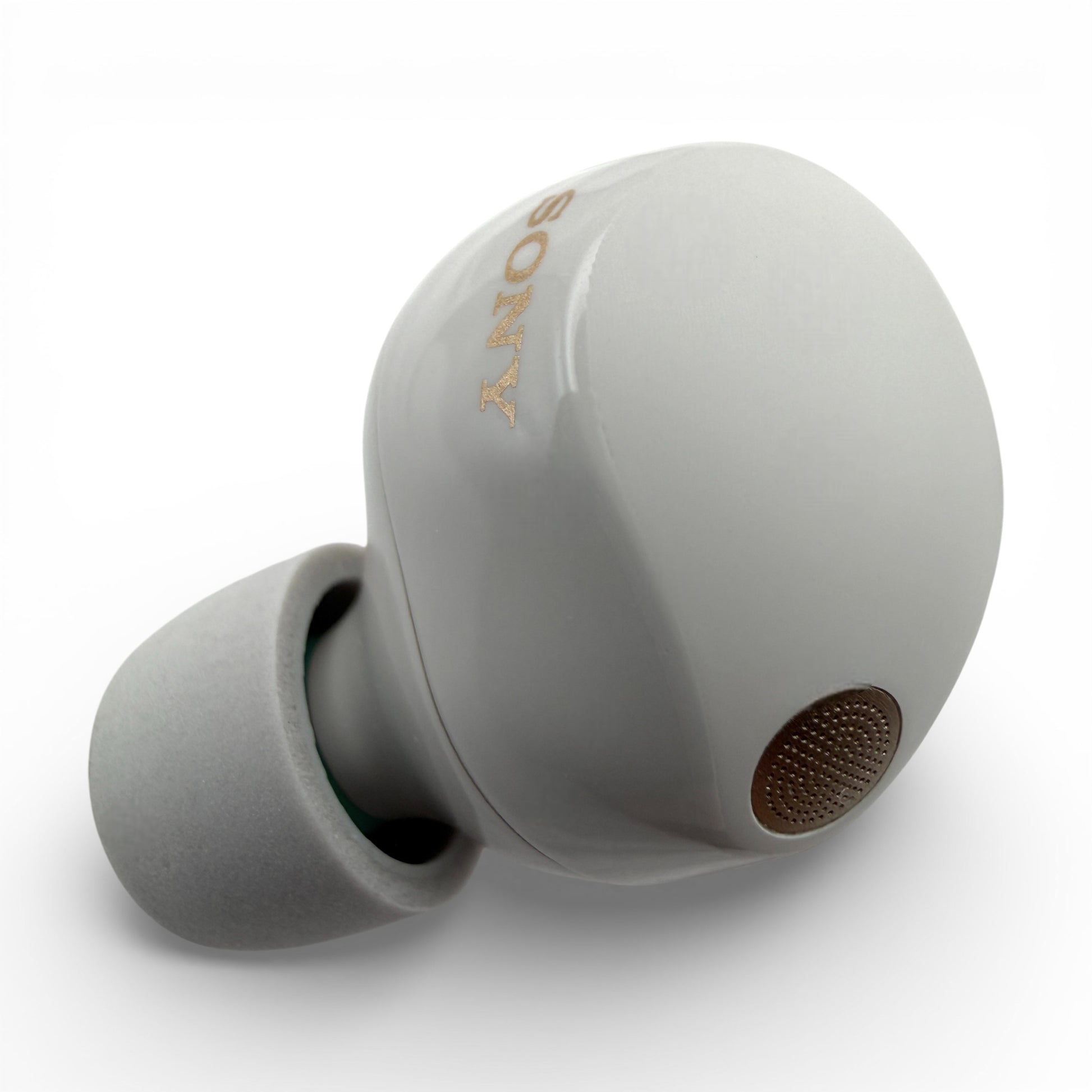 Left replacement Sony WF-1000XM5 earbud in white, front view showing the Sony logo and ear tip attached