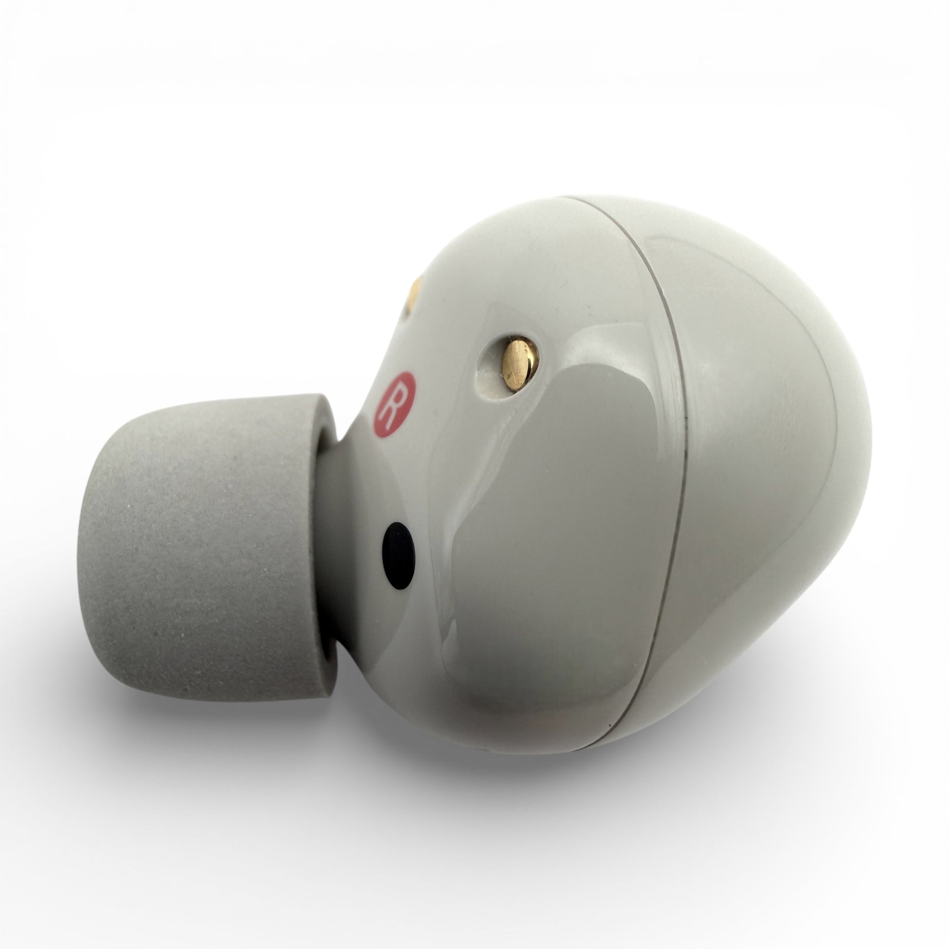 Right replacement Sony WF-1000XM5 earbud in white, back view showing the R marking and charging contact